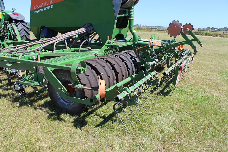 A sprung levelling harrow covers the seed before being pressed with a large-diameter rubber tyre packer.